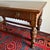 Antique library table by Robert Mitchell Furniture Co. of Cincinnati, Ohio, dating to the early 20th century. This...