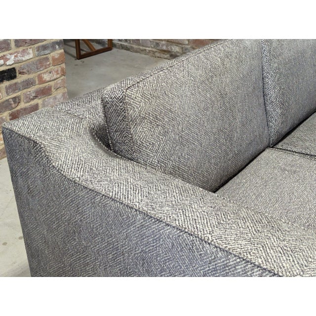 This gorgeous bespoke made corner sofa was designed with blends of white and grey in the sofa’s upholstery, giving a...