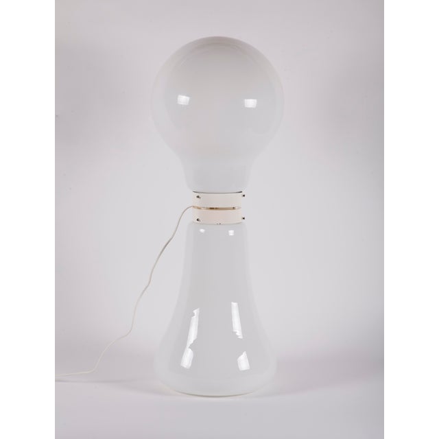 Very large Murano glass floor lamp, no labels present, with llght emitting both from the top and from the lower part....
