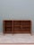 Italian design style sideboard from the 70s composed of a wooden structure, with rectangular shapes, decorated with rattan...