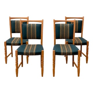 Set of Four Danish Oak Dining Chairs in the Style of Henning Kjærnulf, Denmark, Circa 1970s For Sale