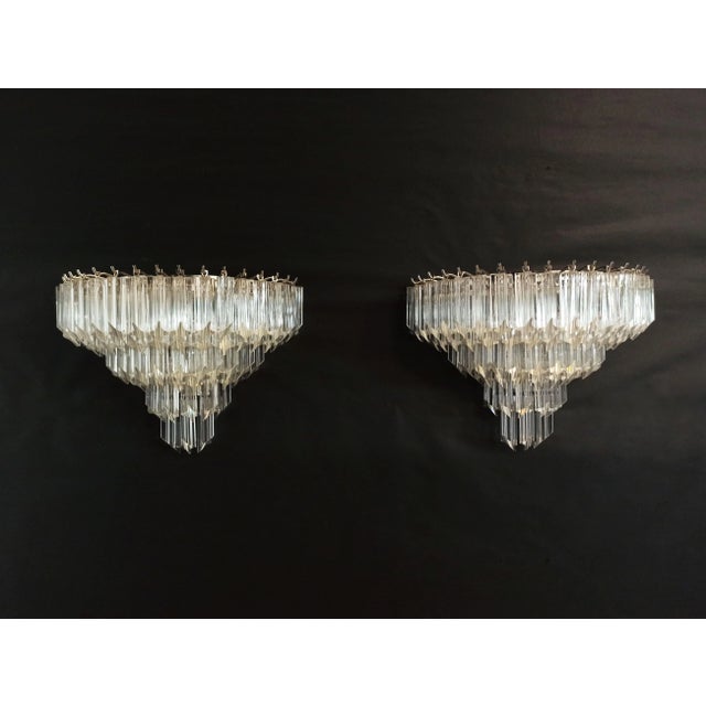 Fantastic pair of vintage Murano wall sconce made by 63 Murano crystal prism (quadriedri) for each applique in a chrome...