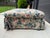 This late 1980s vintage ottoman embodies the relaxed, lived-in comfort associated with classic cottage and country house...