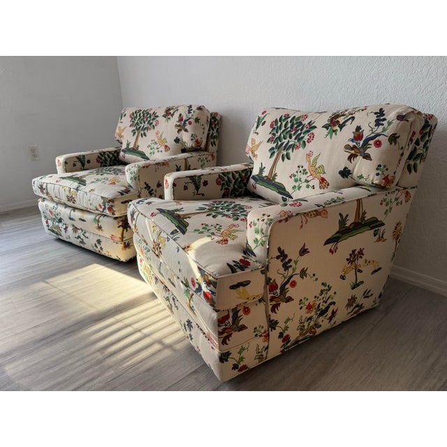 Pair of Lee Jofa white linen fabric with work in reds, greens, blues, and golds, featuring nature scenes. Unmarked