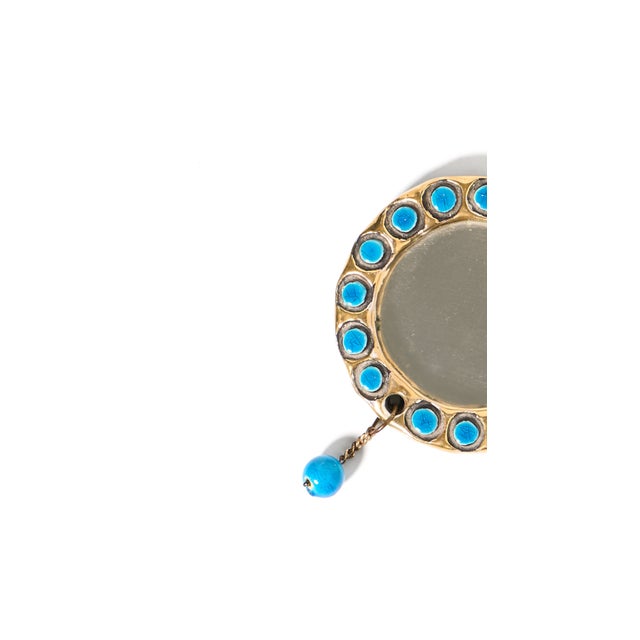 Glazed ceramic miroir de poche with crackled gold and precious blue ceramic adornments. The mirror was created by French...