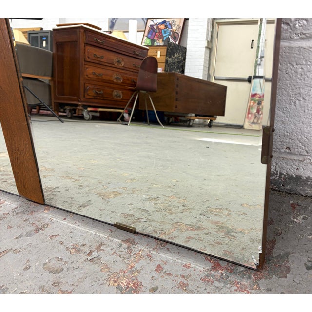 Elevate your interior with timeless vintage style and luminous presence. This Large Beveled Mid-Century Wall Mirror...