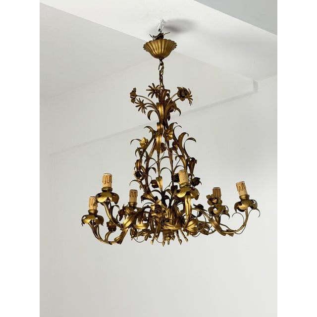 6-light floral chandelier in gold-plated metal, made in Italy, 1960 e14 bulbs. Good condition. We guarantee fast and...