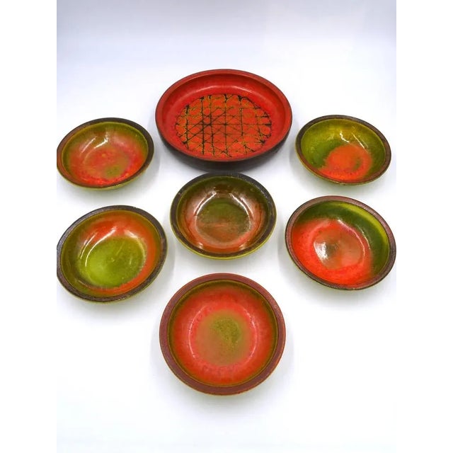 Set consisting of seven bowls made of polychrome glazed ceramic dating back to the seventies by the italian artist alessio...