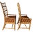 Pair of Palecek Rattan Bamboo Dining Chairs with Leather Cushions Elevate your space with this stunning pair of Palecek...