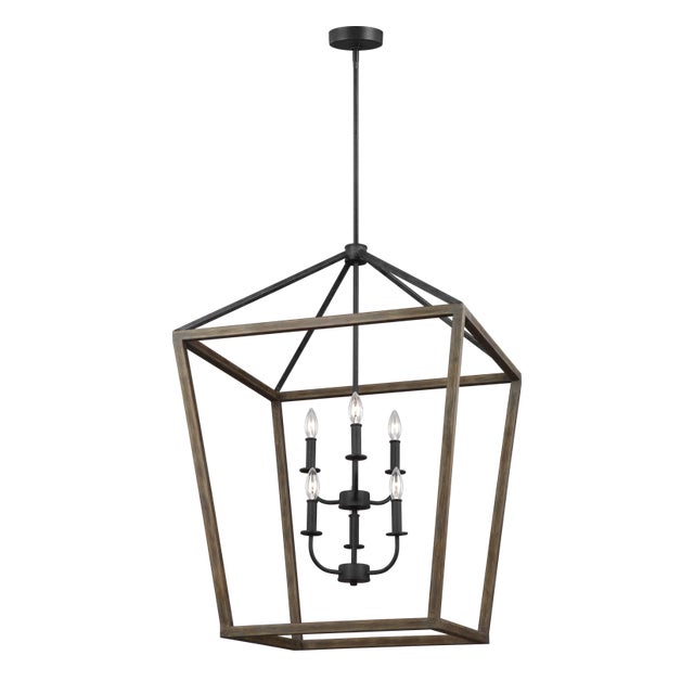 The Sean Lavin Gannet six light single tier chandelier in weathered oak wood / antique forged iron is the perfect way to...