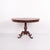 Antique pedestal / serving table from the 19th century, made of mahogany. The table features decorative carved details and...