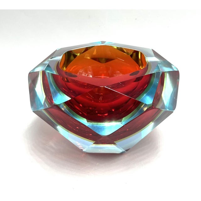This heavy, diamond-shaped ashtray is made of multi-layered, colored Murano glass using the renowned Sommerso technique,...
