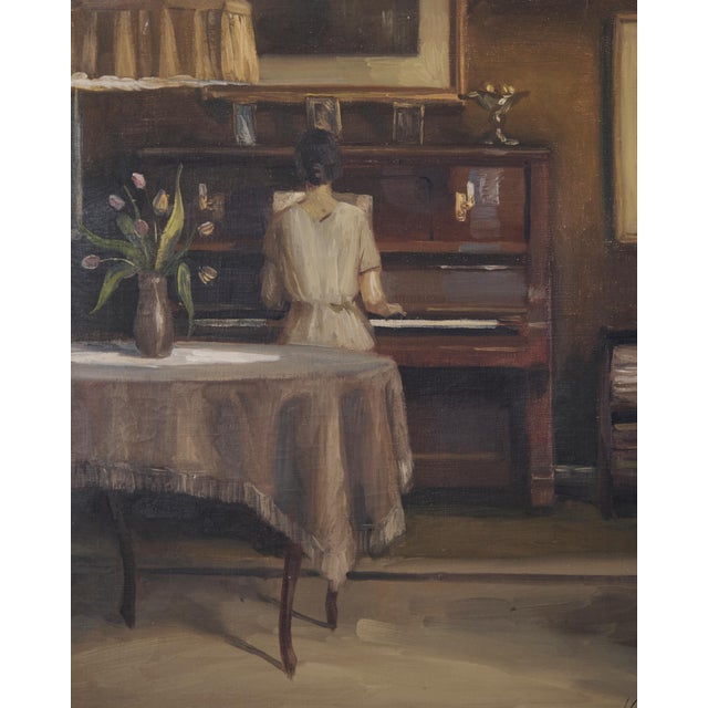 Interior painting on canvas with the motif “Lady at the Piano” from around the 1930s. The painting is signed and mounted...