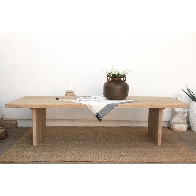 At ten feet long, the Béarn is built for a room that actually entertains. Two solid panel pedestal legs carry the full...