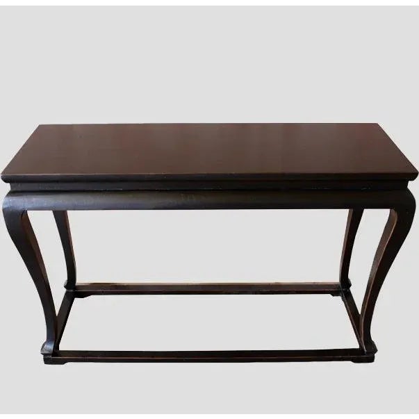 This console is decorated with muted antique black finish with reddish hue, patina and distressed edges and top. With...