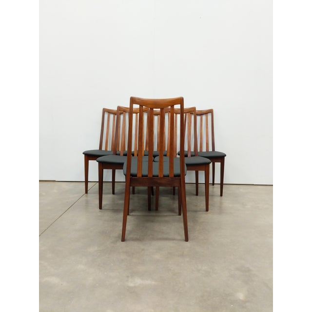 Set of 6 authentic vintage mid century modern dining chairs. In teak and afrormosia (aka African teak) woods. Designed by...