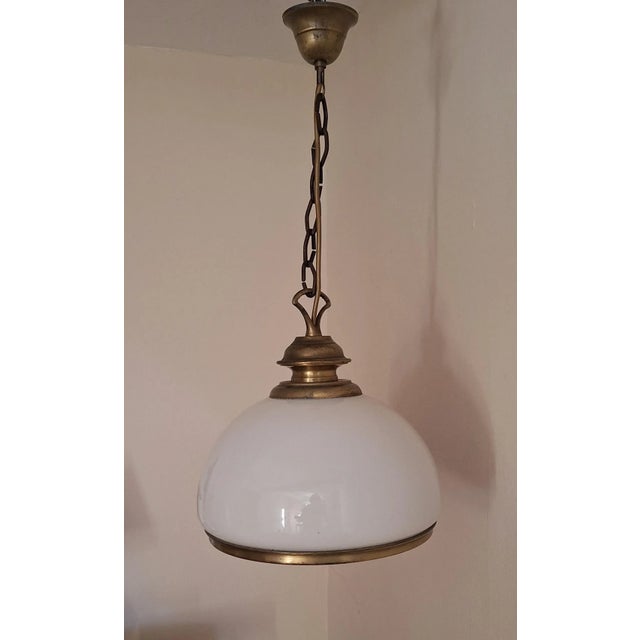 Vintage Rustic Ceiling Lamp with White Glass Shade on Brass Mount, 1980s, in Very Good conditions. Designed 1980 to 1989...