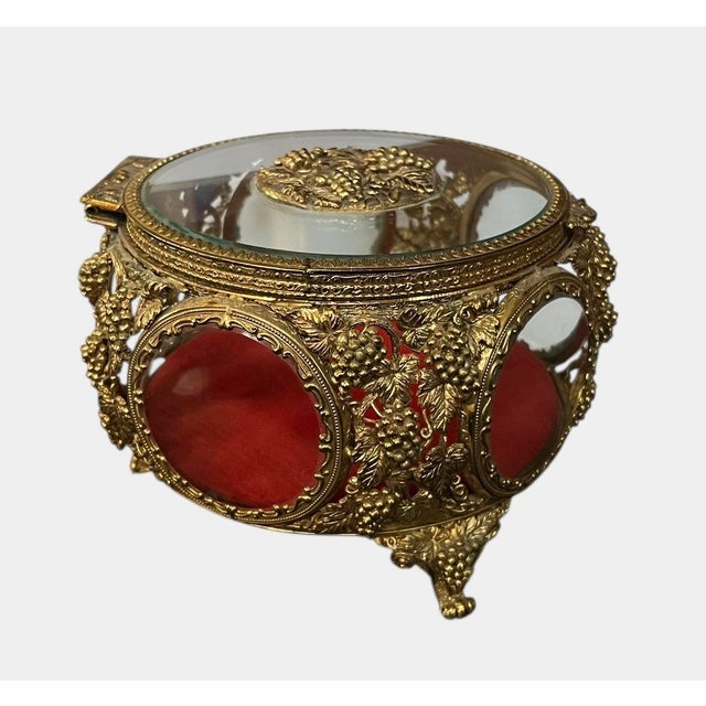 Absolutely stunning ormolu jewelry or trinket casket. Gilt open filigree ormolu metal showing ornate grape vine detail....