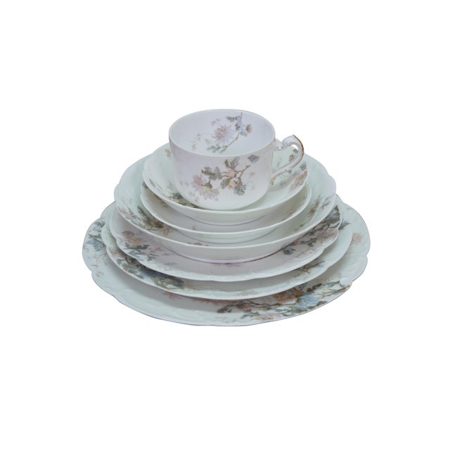 Antique Haviland Limoges china set featuring the Schleiger 86 floral motif, identified by delicate flowers like...