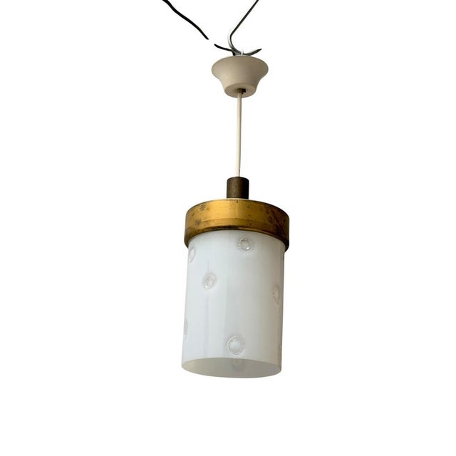 Stunning and rare Mid-Century Modern Murano pendant lamp. Striking Italian design from the 1960s. Patinated bronze and...