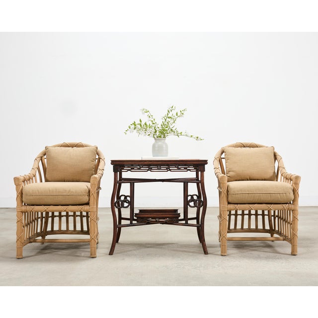 A finely crafted Chinese export Qing Dynasty style carved hardwood occasional, tea, or side table. The table features a...