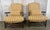 Pair of French Country lounge chairs in the timeless manner of Ralph Lauren Home. This ensemble masterfully blends rustic...