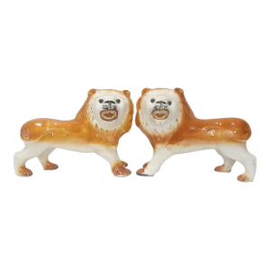 A Pair of Antique Staffordshire Porcelain Lions