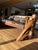 Handmade luxury real cowhide sofa with solid Wyoming mountain wood frame and antler back detail. One‑of‑a‑kind statement...