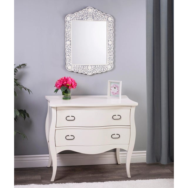 Bring a cottage charm to your master suite or entryway with this mango Wood lightly distressed white finished two drawer...