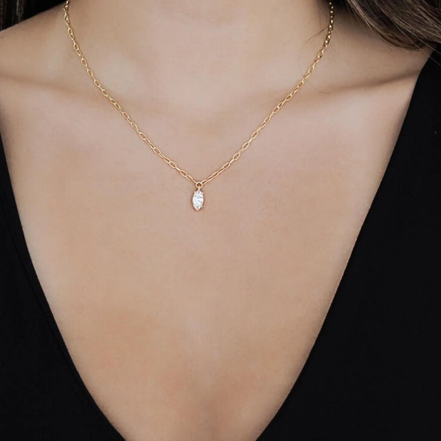 The stunning Gold and Diamond Chain Necklace, a true embodiment of elegance and sophistication. This exquisite piece of...