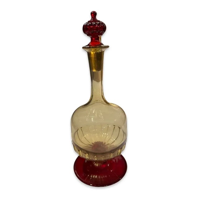 This beautiful set of decorated glasses and decanters derive their rich red color from the use of gold chloride. For this...