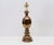 Simply gorgeous metallic bronze tone glaze makes this ceramic piece truly eye-catching. Likely made by Haeger Potteries....