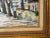 Painted on canvas using a palette and framed in a beautifully carved golden wood, the old world central park is tree-...