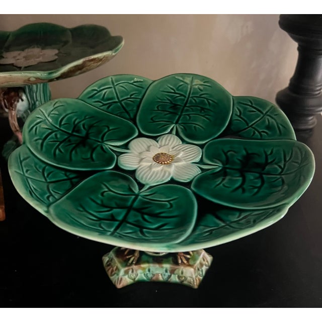 Antique majolica compote with a Pond lily top on a pedestal of three cranes, attributed to Adams & Bromley, English, c....