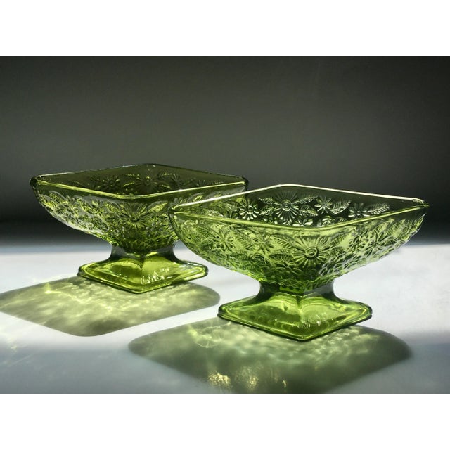 A great pair of mid century accent dishes, perfect for adding a pop of color to your space with a great floral pattern.