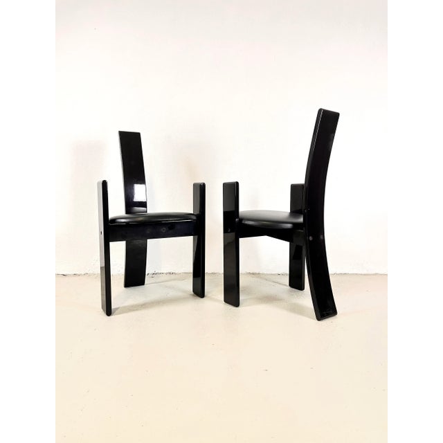 An elegant pair of Golem chairs, designed by Vico Magistretti and produced by the Italian company Poggi in the 1970s....
