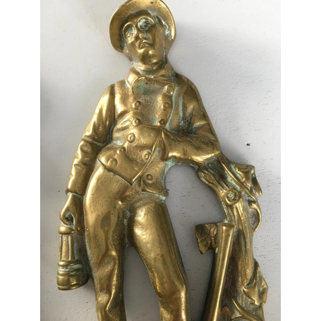 1950s brass figurines, set of 2 dimensions: - high 22 cm - 8 cm wide - 4 cm deep. Woman: - 21 height - 8 width - 4 cm deep