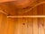 This is a mid 20th century rustic scrubbed pine hand carved armoire. This armoire has beautifully hand card French country...