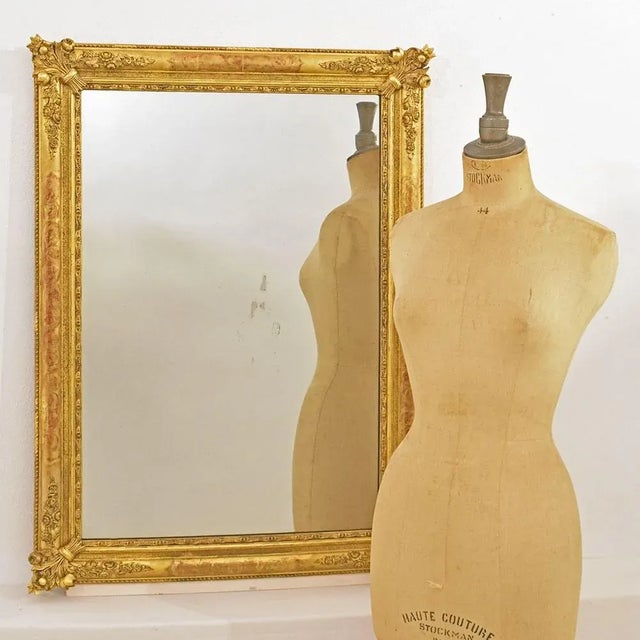 The Antique Rectangular Wall Mirror, proposed here is an elegant mirror with a Golden Frame in pure Gold Leaf. Restored...
