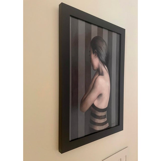 Shying Away by Kelly Birkenruth | Oil on panel of a woman with her back turned against stripes For Sale