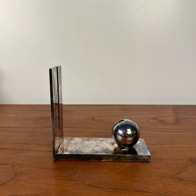 This is a postmodern, Italian, silver plated picture frame designed by Richard Meier for Swid Powell. The ball and...