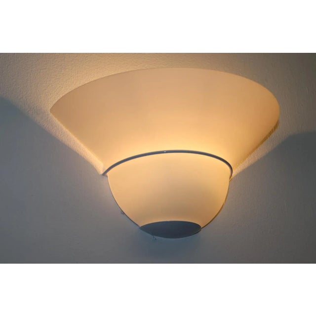 1980s Modern Wall Lamp Murano Hand Blown White Glass Satin Finish. Hardware White Lacquered Metal. "Loto Piccolo" made by...