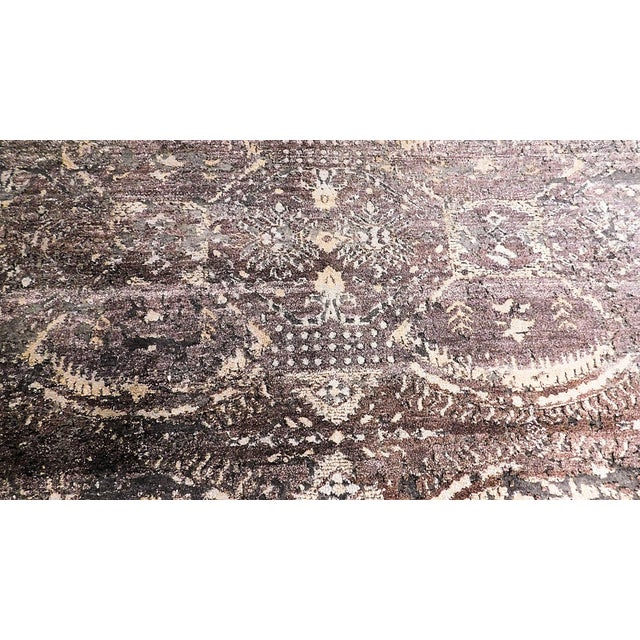 Hand knotted bamboo silk and wool rug in high and low texture. All over damask abstract pattern. The low pile is wool, and...