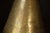 An impressive early 20th-century Islamic brass vase, circa 1920, distinguished by its monumental 28-inch height, elegant...