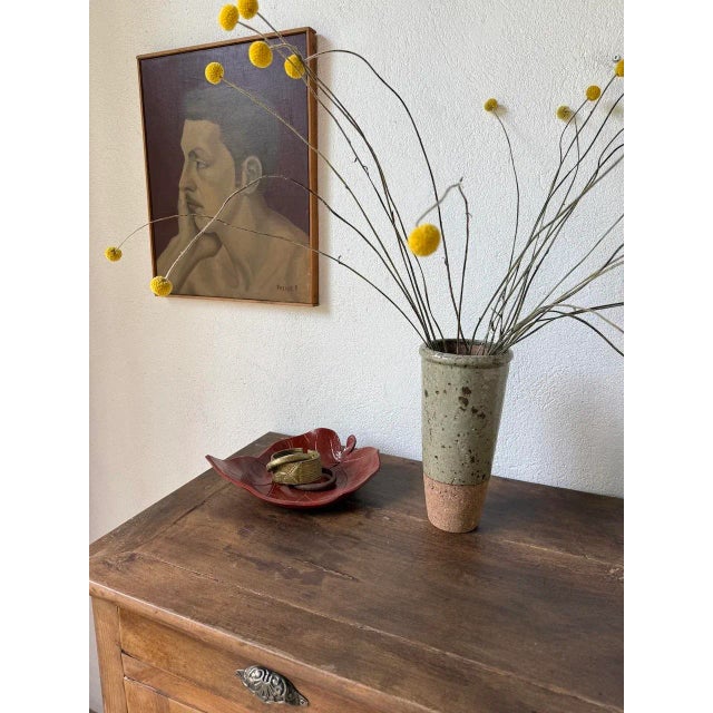 Antique handmade ceramic dish in the shape of a burgundy red leaf. We love the slightly naive design of the whole. Ideal...