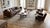 This exquisite turn-of-the-century antique Mashad rug showcases a sophisticated allover field of scrolling vines, delicate...