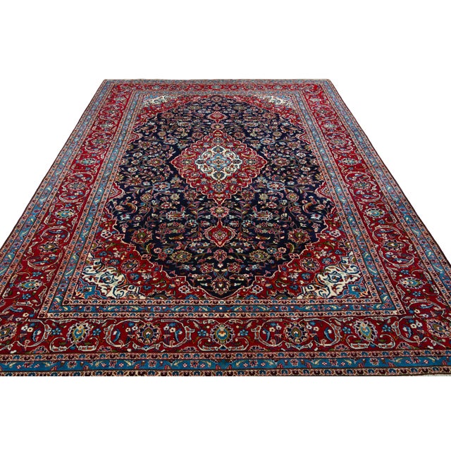 A magnificent masterpiece of classic rug art: This hand-knotted Kashan cork rug impresses with its opulent design,...