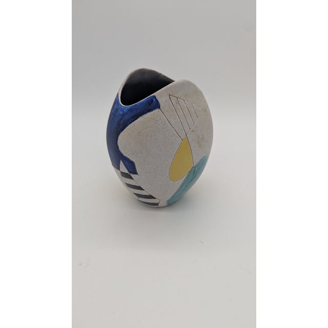 Mid Century West German Vase. Eye catching modern shapes delineated in surface etched line work. Wide fish mouth lip,...