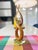 Striking vintage Murano-style art glass sculpture featuring an elegant "Love Knot" design in rich amber tones. Handcrafted...