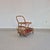 Original 1970s bar cart made of bent wicker. The cart features a two-tier construction, with a large upper tray with a...